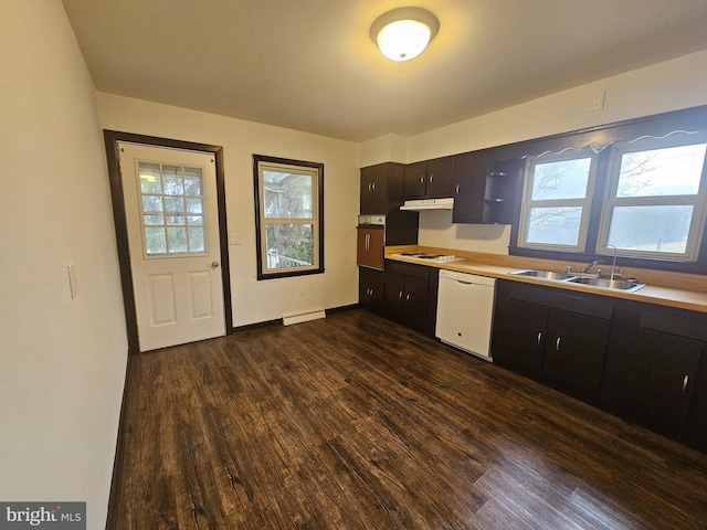 kitchen with dark wood-style floors, baseboard heating, a sink, white appliances, and under cabinet range hood