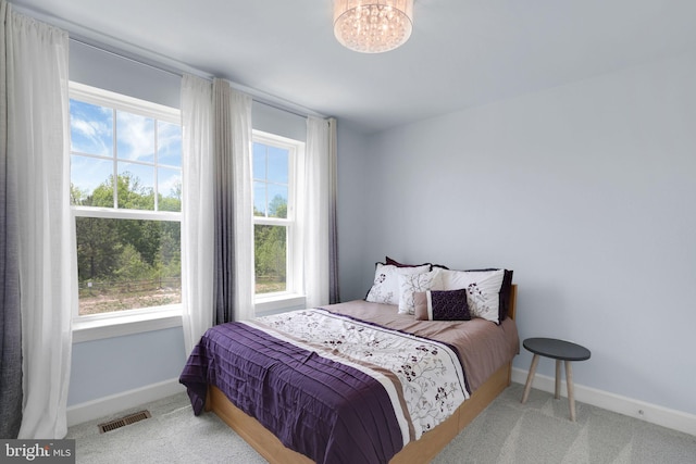 3802 Rock Spring Dr, Upper Marlboro, MD 20772 - bedroom featuring visible vents, carpet, baseboards, and an inviting chandelier