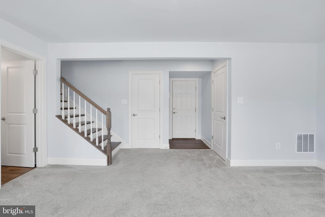 3802 Rock Spring Dr, Upper Marlboro, MD 20772 - carpeted spare room with visible vents, baseboards, and stairs