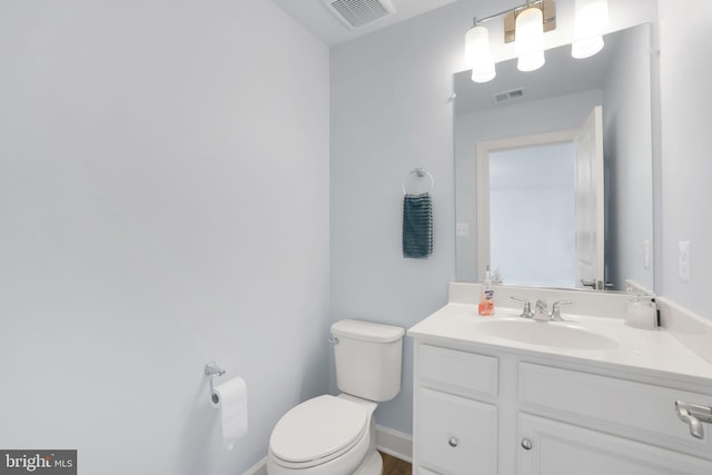 3802 Rock Spring Dr, Upper Marlboro, MD 20772 - bathroom with visible vents, baseboards, toilet, and vanity