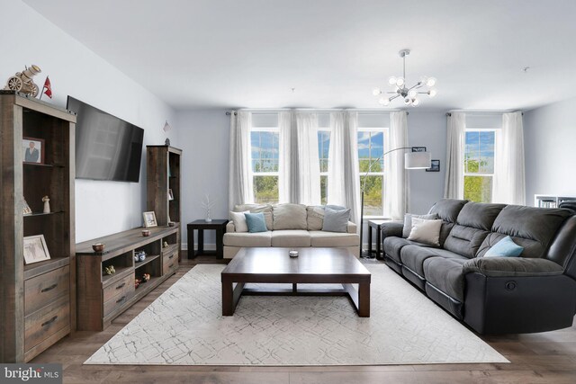 3802 Rock Spring Dr, Upper Marlboro, MD 20772 - living area with an inviting chandelier and wood finished floors