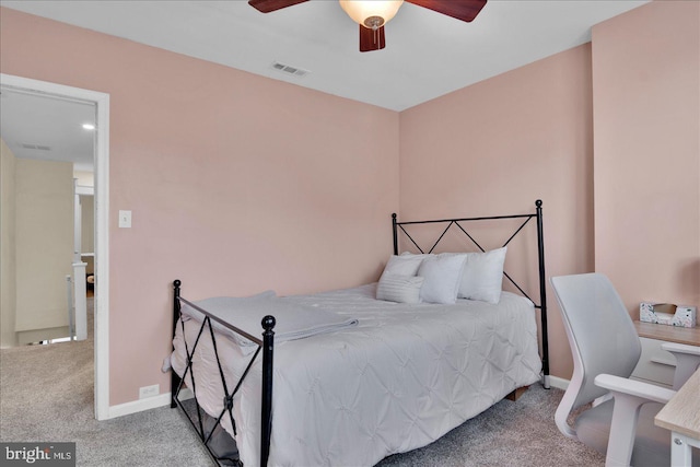 bedroom featuring carpet, visible vents, ceiling fan, and baseboards