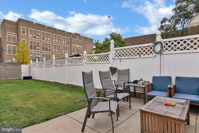 view of patio / terrace featuring a fenced backyard and outdoor lounge area