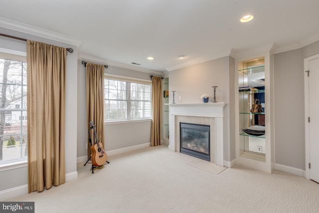 living room with visible vents, baseboards, ornamental molding, carpet, and a fireplace