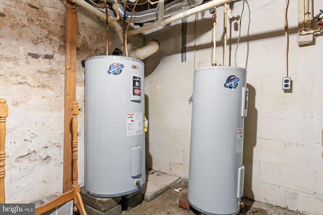 utility room featuring electric water heater