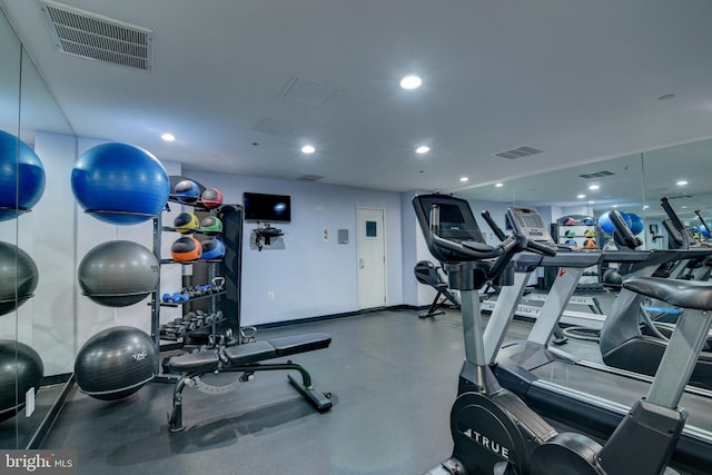 gym with visible vents and recessed lighting