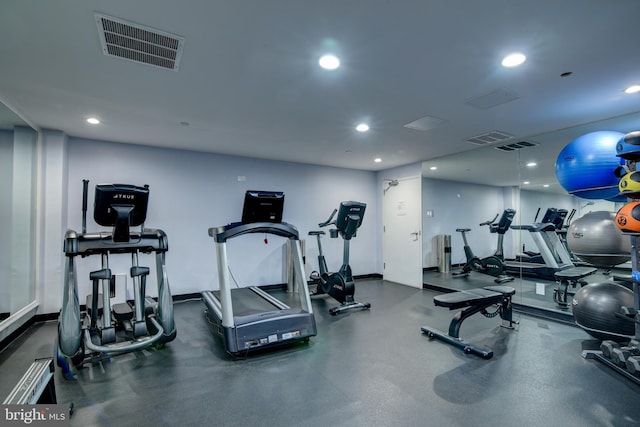 workout area featuring visible vents and recessed lighting