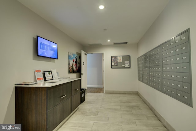 corridor featuring recessed lighting, visible vents, and baseboards