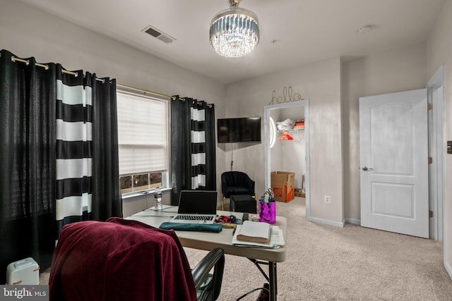 home office with baseboards, visible vents, a chandelier, and carpet flooring