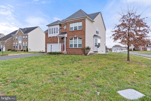 view of front of property featuring a garage, a front lawn, aphalt driveway, and brick siding