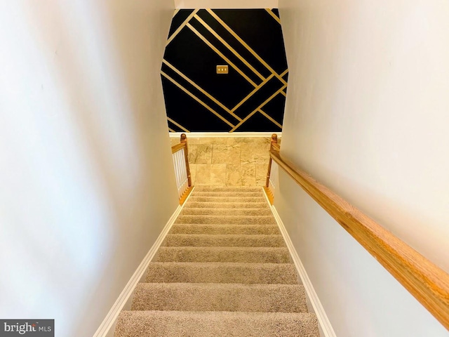 staircase with baseboards