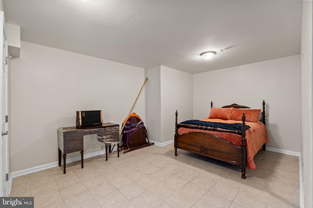 bedroom with baseboards