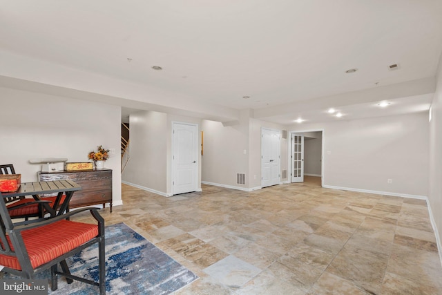 interior space featuring visible vents and baseboards