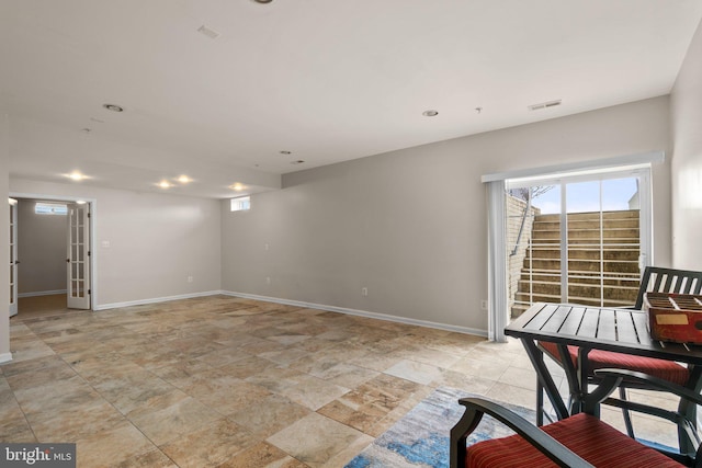 interior space featuring visible vents and baseboards