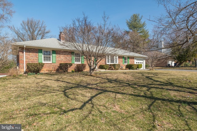 single story home with a garage, brick siding, a chimney, and a front lawn