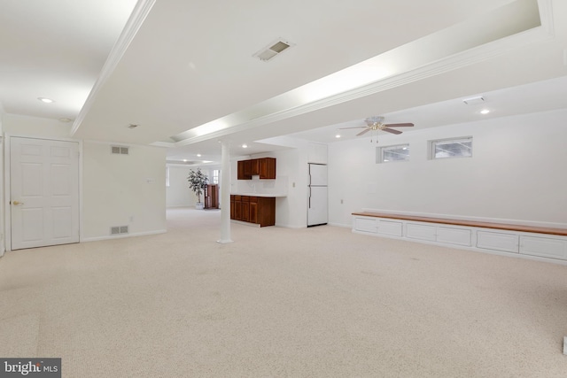 basement with recessed lighting, visible vents, light colored carpet, and ceiling fan