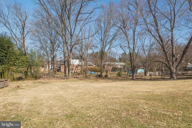 view of yard with fence