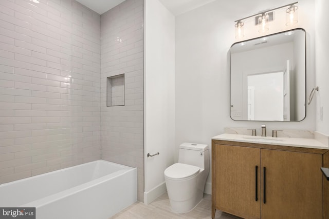 bathroom featuring washtub / shower combination, baseboards, vanity, and toilet