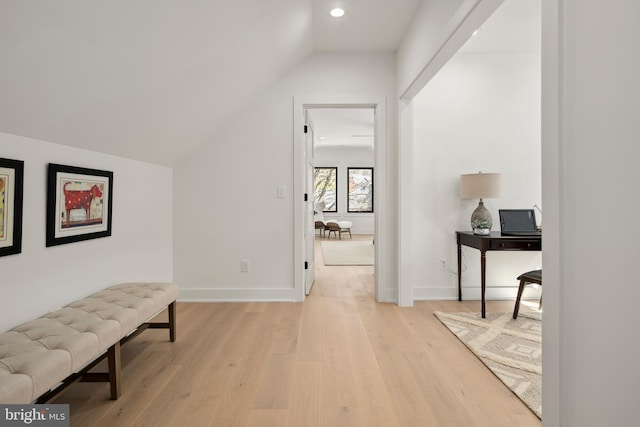 corridor featuring lofted ceiling, recessed lighting, light wood-type flooring, and baseboards