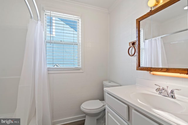 full bathroom with crown molding, tile walls, curtained shower, toilet, and vanity