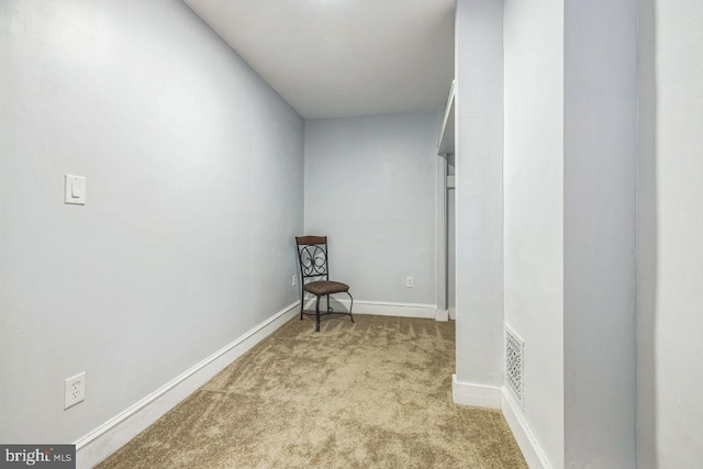 interior space featuring carpet floors and visible vents