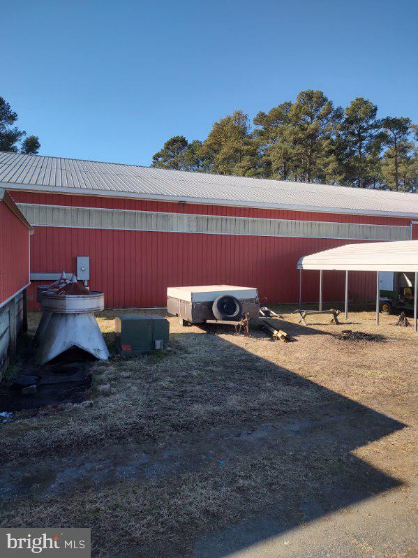 exterior space with an outbuilding