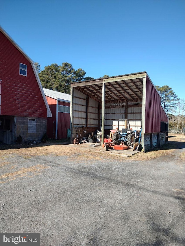 view of pole building with a detached carport