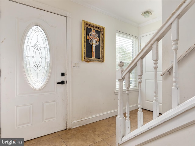 244 Raintree Blvd, Stafford, VA 22556 - foyer entrance with tile patterned floors, crown molding, baseboards, and stairs