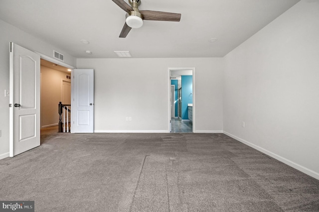 unfurnished bedroom with visible vents, baseboards, and carpet flooring