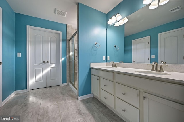 full bathroom with a sink, visible vents, and a stall shower