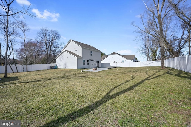 view of yard featuring a patio and a fenced backyard