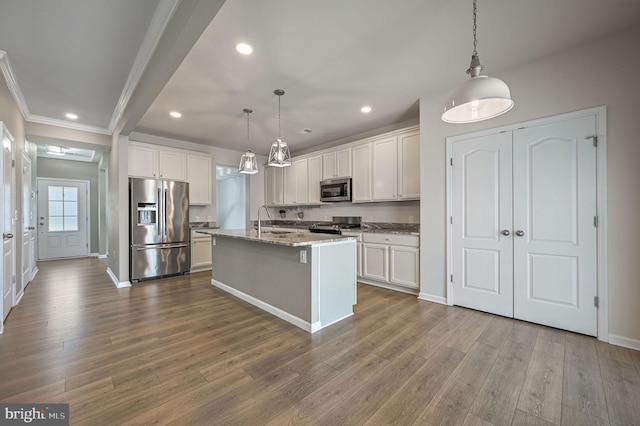 kitchen featuring a sink, dark wood finished floors, white cabinetry, and stainless steel appliances