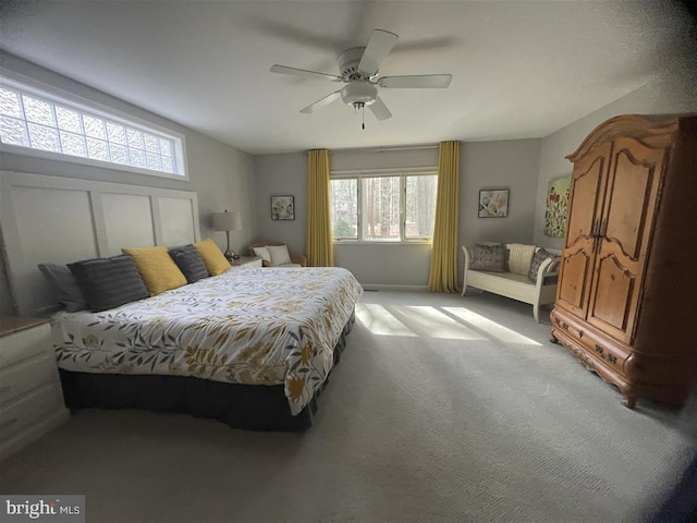 bedroom featuring a ceiling fan and light carpet