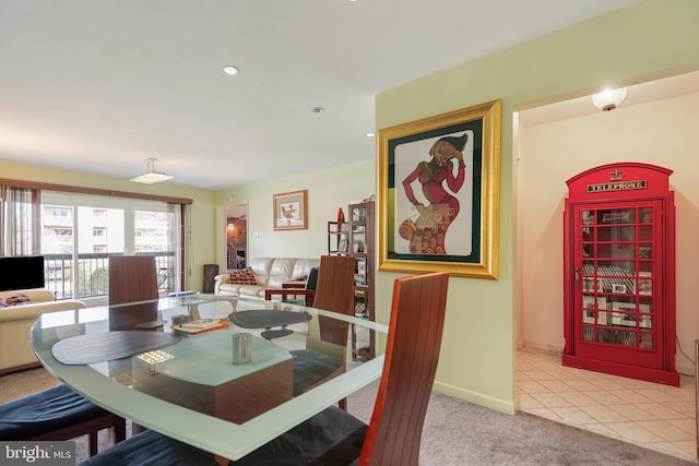 dining area with recessed lighting, baseboards, carpet flooring, and tile patterned floors