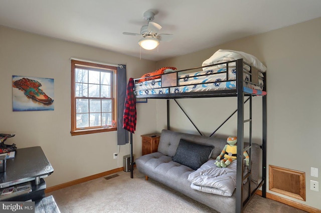 bedroom featuring a ceiling fan, carpet, visible vents, and baseboards