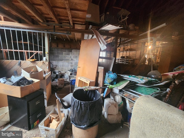 miscellaneous room with concrete block wall