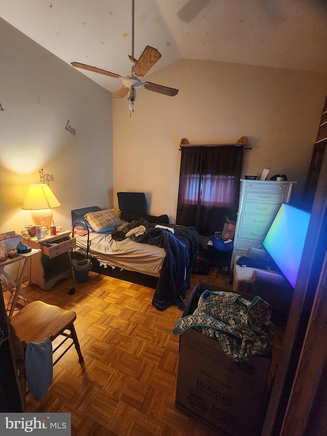 bedroom featuring vaulted ceiling and a ceiling fan