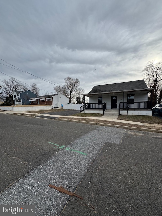 view of road featuring curbs and sidewalks