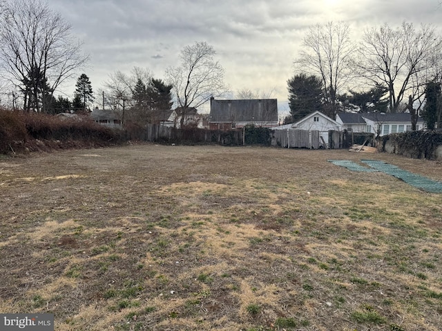 view of yard with fence