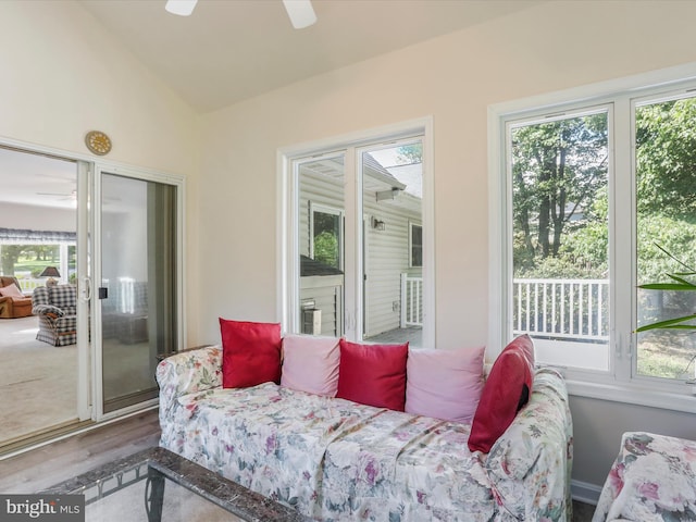 bedroom with vaulted ceiling and a ceiling fan