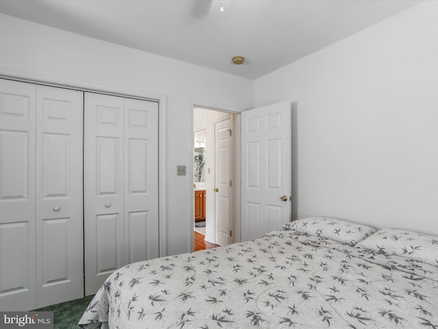 bedroom with a closet and ceiling fan