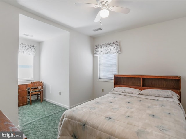 bedroom featuring a ceiling fan, carpet, visible vents, and baseboards