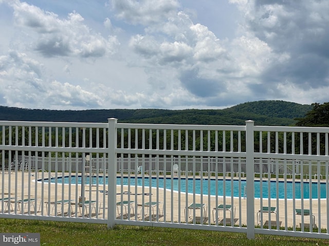 pool featuring fence