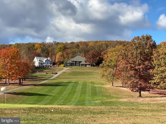 surrounding community featuring a lawn