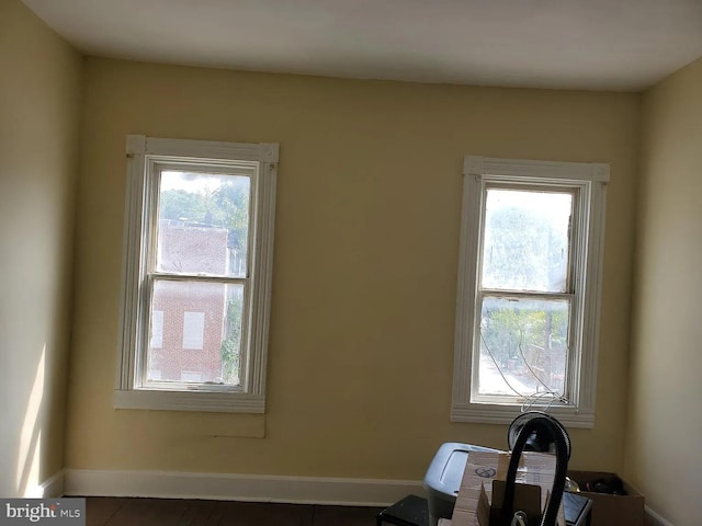 interior space with plenty of natural light and baseboards