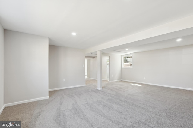 basement featuring carpet, recessed lighting, and baseboards