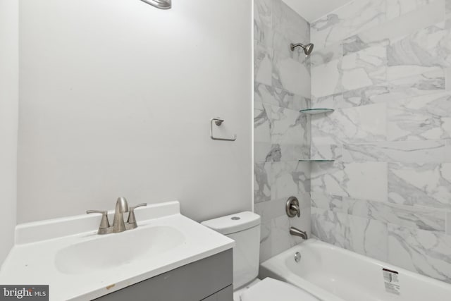 bathroom with shower / bathing tub combination, toilet, and vanity