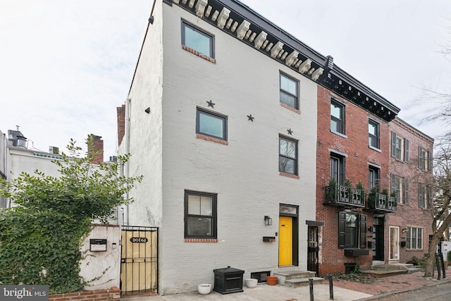 view of building exterior with entry steps