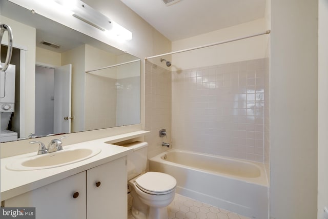 full bathroom with visible vents, shower / bathing tub combination, vanity, and toilet