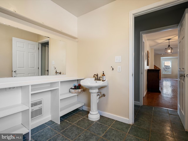 bathroom featuring baseboards